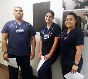 AUHS nursing students Ryan Albano, Brittany Harwick, and Kristine Barlis waiting for their turn in Boot Camp on Tuesday, March, 28, 2017.